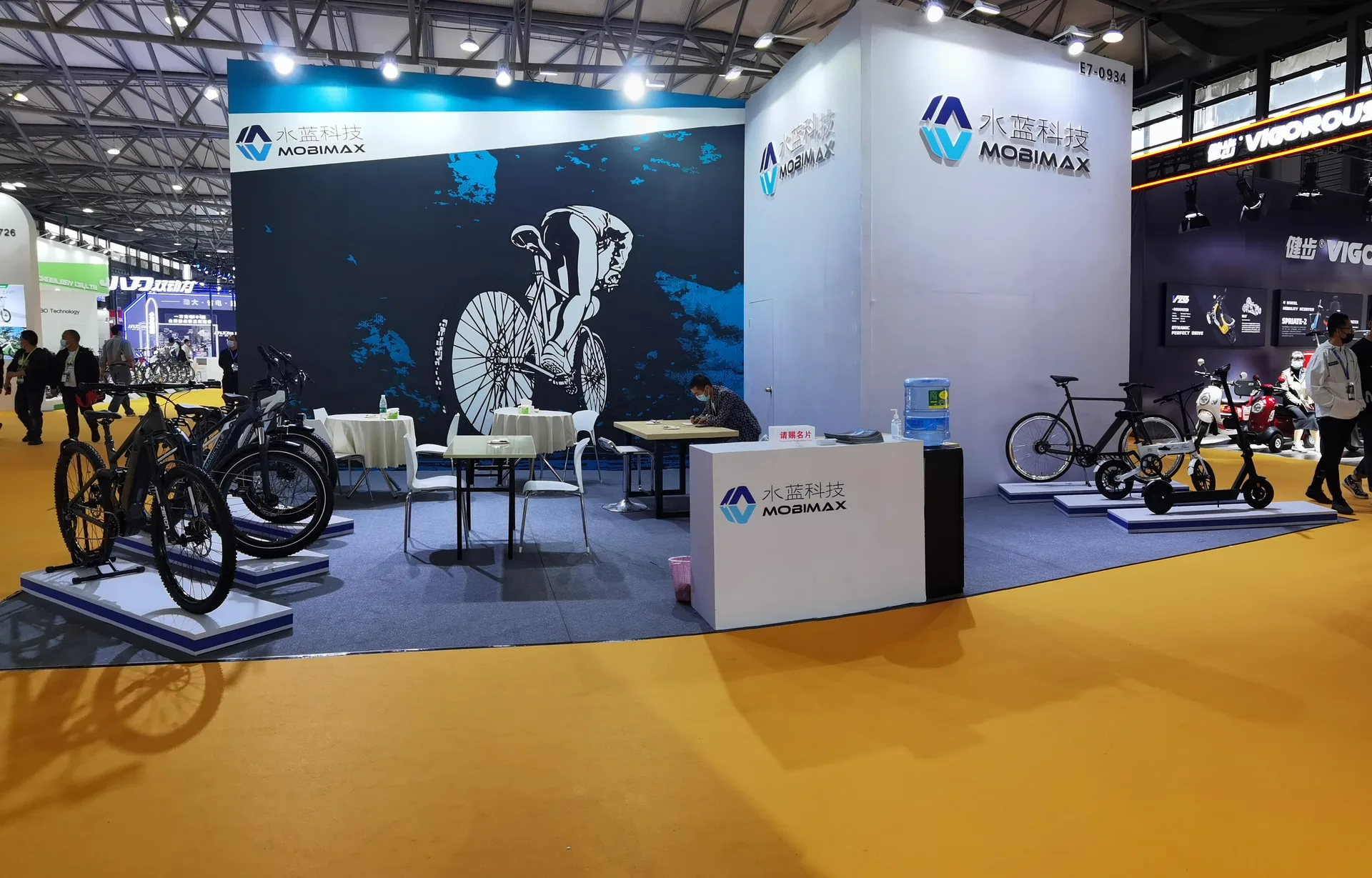 Mobimax team meeting mobility partners at an industry exhibition